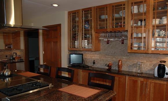 Kitchen Remodeling in Denver with center island stove and bar seating