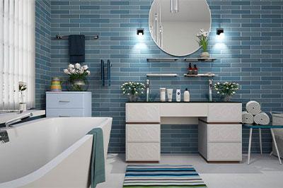 Bathroom with blue walls and white vanities after having a bathroom Renovation in Denver