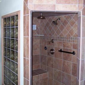 Walk in shower with bench seating for aging in place remodeling in Denver