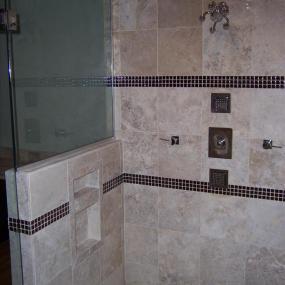 Shower with upgraded showerhead and custom tiling